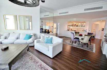 Living / Dining Room image for: Apartment - 3 Bedrooms - 4 Bathrooms for sale in Al Tamr - Shoreline Apartments - Palm Jumeirah - Dubai, Image 1