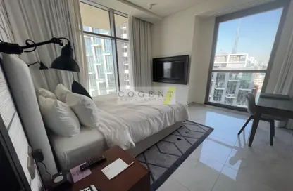 Room / Bedroom image for: Apartment - 1 Bedroom - 2 Bathrooms for sale in Millennium Atria Business Bay - Business Bay - Dubai, Image 1