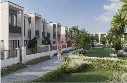 Outdoor Building image for: Townhouse - 4 Bedrooms - 4 Bathrooms for sale in Shams Townhouses - Town Square - Dubai, Image 1