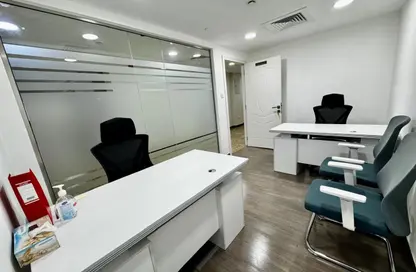 Office Space - Studio - 4 Bathrooms for rent in Hamdan Street - Abu Dhabi