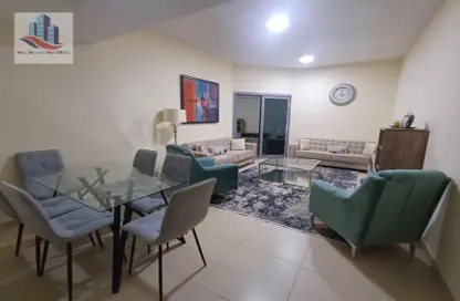Living / Dining Room image for: Apartment - 3 Bedrooms - 3 Bathrooms for rent in Sahab Al Emarat Tower - Al Mamzar - Sharjah - Sharjah, Image 1