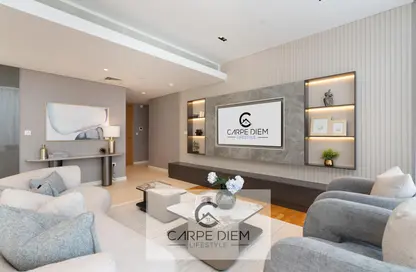 Living Room image for: Apartment - 2 Bedrooms - 4 Bathrooms for rent in Apartment Building 6 - Bluewaters Residences - Bluewaters - Dubai, Image 1