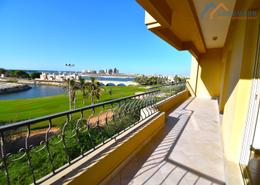 Balcony image for: Apartment - 1 bedroom - 2 bathrooms for rent in Golf Apartments - Al Hamra Village - Ras Al Khaimah, Image 1