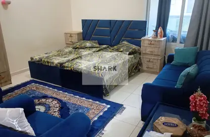 شقة - غرفة نوم - 2 حمامات للبيع في أورينت تاور 1 - أورينت تاور - البستان - عجمان