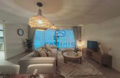 Living Room image for: Duplex - 2 Bedrooms - 3 Bathrooms for sale in Pacific Tonga - Pacific - Al Marjan Island - Ras Al Khaimah, Image 1