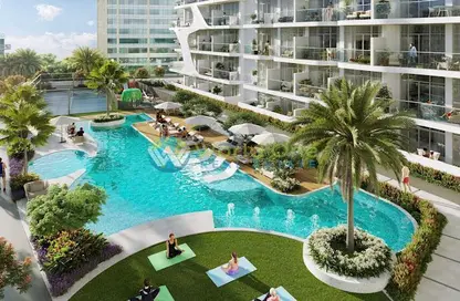 صورة لـ حوض سباحة شقة - 1 حمام للبيع في اكسفورد جاردنز - ارجان - دبي ، صورة رقم 1
