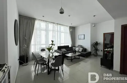 Living / Dining Room image for: Apartment - 3 Bedrooms - 4 Bathrooms for sale in Marina Pinnacle - Dubai Marina - Dubai, Image 1