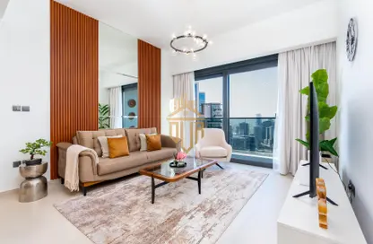 Living Room image for: Apartment - 2 Bedrooms - 3 Bathrooms for rent in Act Towers - Opera District - Downtown Dubai - Dubai, Image 1