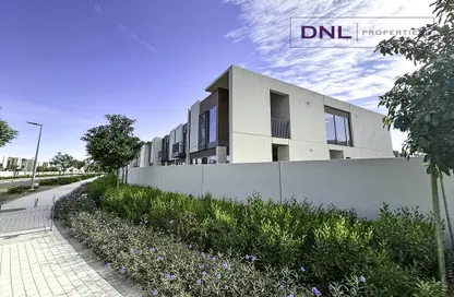Outdoor House image for: Townhouse - 4 Bedrooms - 6 Bathrooms for sale in Cherrywoods - Dubai Land - Dubai, Image 1