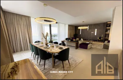 Living / Dining Room image for: Villa - 4 Bedrooms - 5 Bathrooms for sale in Bluebay Walk - Sharjah Waterfront City - Sharjah, Image 1
