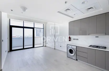 Kitchen image for: Apartment - 1 Bedroom - 2 Bathrooms for sale in Azizi Riviera 23 - Meydan One - Meydan - Dubai, Image 1