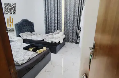 Apartment - 2 Bedrooms - 2 Bathrooms for rent in Oasis Tower - Al Rashidiya 1 - Al Rashidiya - Ajman