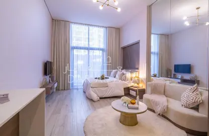 Living Room image for: Apartment - 1 Bathroom for sale in Laya Heights - Dubai Studio City - Dubai, Image 1