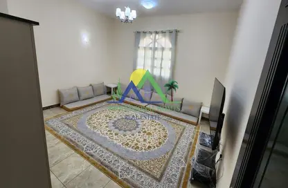 Living Room image for: Apartment - 1 Bedroom - 2 Bathrooms for rent in Al Markhaniya - Al Ain, Image 1