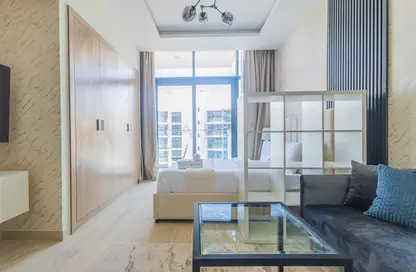 Living Room image for: Apartment - 1 Bedroom - 1 Bathroom for rent in AZIZI Riviera 10 - Meydan One - Meydan - Dubai, Image 1