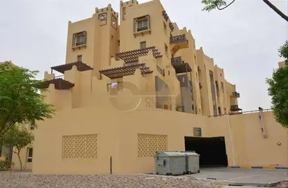 Outdoor Building image for: Apartment - 2 Bedrooms - 2 Bathrooms for sale in Al Thamam 28 - Al Thamam - Remraam - Dubai, Image 1