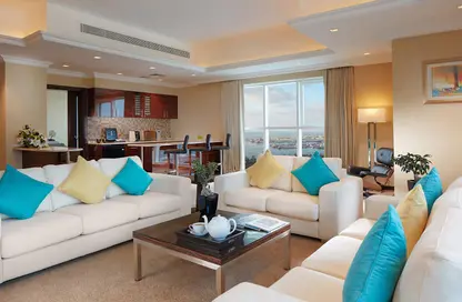 Living Room image for: Hotel  and  Hotel Apartment - 2 Bedrooms - 3 Bathrooms for rent in Jannah Burj Al Sarab - Mina Road - Tourist Club Area - Abu Dhabi, Image 1