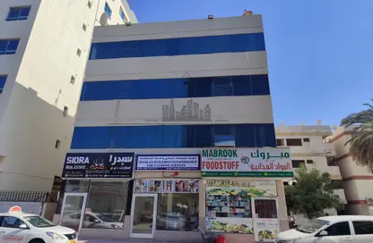 Outdoor Building image for: Whole Building - Studio for sale in Al Rumailah 2 - Al Rumaila - Ajman, Image 1