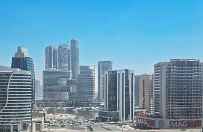 Apartment - 2 Bedrooms - 2 Bathrooms for sale in Boulevard Point - Downtown Dubai - Dubai