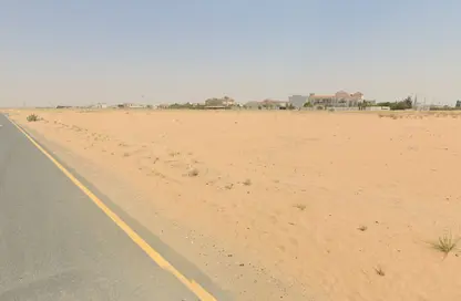 أرض - استوديو للبيع في روضة القرط - ضاحية الروضات - الشارقة