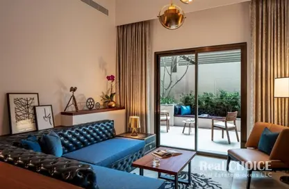 صورة لـ غرفة المعيشة النزل و الشقق الفندقية - غرفة نوم - 2 حمامات للايجار في فندق وشقق دبل تري من هيلتون دبي إم سكوير - منخول - بر دبي - دبي ، صورة رقم 1