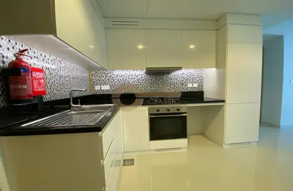 صورة لـ مطبخ شقة - غرفة نوم - 2 حمامات للبيع في آيكون سيتي  تاور سي - آيكن سيتي - الخليج التجاري - دبي ، صورة رقم 1