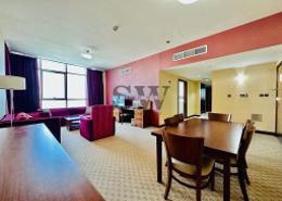 Living / Dining Room image for: Apartment - 2 bedrooms - 3 bathrooms for rent in Danat Tower A - Danat Towers - Muroor Area - Abu Dhabi, Image 1