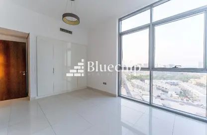Empty Room image for: Apartment - 1 Bedroom - 2 Bathrooms for sale in Dezire Residences - Jumeirah Village Circle - Dubai, Image 1