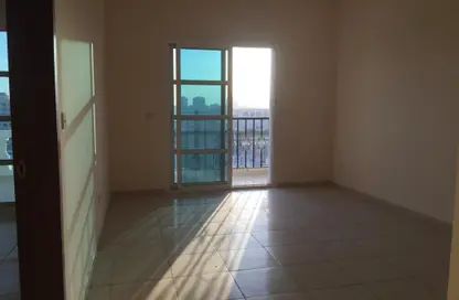 Empty Room image for: Apartment - 1 Bedroom - 1 Bathroom for sale in Qasr Sabah - Dubai Production City (IMPZ) - Dubai, Image 1