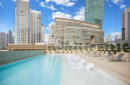 صورة لـ حوض سباحة شقة - 3 غرف نوم - 4 حمامات للبيع في رزيدينس 110 - الخليج التجاري - دبي ، صورة رقم 1