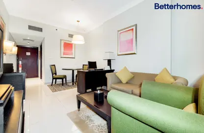 صورة لـ غرفة المعيشة / غرفة الطعام شقة - غرفة نوم - 1 حمام للايجار في فندق تو سيزنز للشقق فندقية - مدينة دبي الإعلامية - دبي ، صورة رقم 1