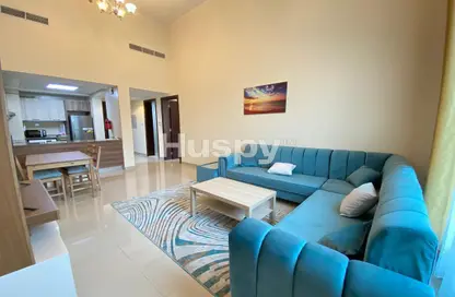 Living / Dining Room image for: Apartment - 1 Bedroom - 2 Bathrooms for sale in Roxana Residence D - Roxana Residences - Jumeirah Village Circle - Dubai, Image 1