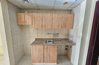 Apartment - Studio - 1 Bathroom for rent in IC1-EMR-08 - Emirates Cluster - International City - Dubai