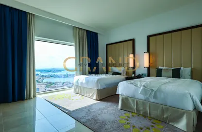 Room / Bedroom image for: Apartment - 2 Bedrooms - 3 Bathrooms for sale in Fairmont Marina Residences - The Marina - Abu Dhabi, Image 1
