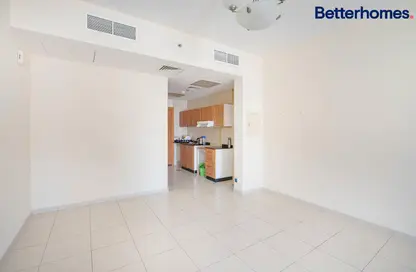 Empty Room image for: Apartment - 1 Bathroom for sale in Maple 2 - Emirates Gardens 2 - Jumeirah Village Circle - Dubai, Image 1