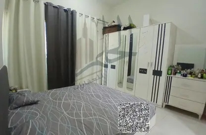 Apartment - 2 Bedrooms - 3 Bathrooms for sale in Smart Tower 1 - Al Amerah - Ajman