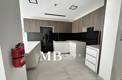 صورة لـ مطبخ شقة - غرفة نوم - 2 حمامات للبيع في مروة هايتس - قرية الجميرا سركل - دبي ، صورة رقم 1