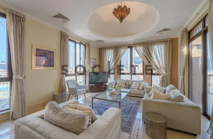 Living Room image for: Apartment - 4 Bedrooms - 5 Bathrooms for sale in Kamoon 4 - Kamoon - Old Town - Dubai, Image 1