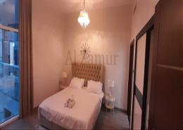 Room / Bedroom image for: Apartment - 1 bedroom - 2 bathrooms for rent in Glitz - Dubai Studio City - Dubai, Image 1