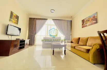 Living Room image for: Apartment - 1 Bedroom - 1 Bathroom for rent in Al Wahda Street - Al Wahda - Abu Dhabi, Image 1