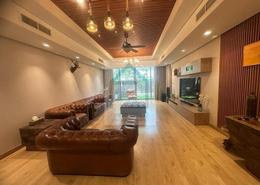 Living Room image for: Townhouse - 4 bedrooms - 5 bathrooms for rent in Gardenia Townhomes - Wasl Gate - Dubai, Image 1