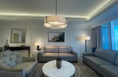 Living Room image for: Apartment - 1 Bedroom - 2 Bathrooms for rent in Kempinski BLVD - Downtown Dubai - Dubai, Image 1