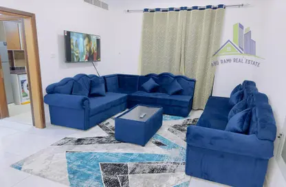Living Room image for: Apartment - 1 Bedroom - 2 Bathrooms for rent in Geepas Building 3 - Al Rashidiya 2 - Al Rashidiya - Ajman, Image 1