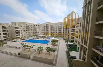 Pool image for: Apartment - 2 Bedrooms - 2 Bathrooms for rent in Zahra Apartments - Town Square - Dubai, Image 1