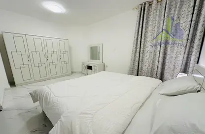 شقة - غرفة نوم - 2 حمامات للايجار في مبنى جيباس 3 - الراشدية 2 - الراشدية - عجمان