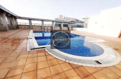 صورة لـ حوض سباحة شقة - غرفة نوم - 1 حمام للايجار في B برج دانات - أبراج دانات - منطقة المرور - أبوظبي ، صورة رقم 1