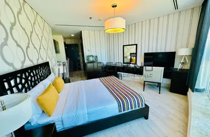 Apartment - Studio - 1 Bathroom for rent in Al Ghaith Tower - Hamdan Street - Abu Dhabi