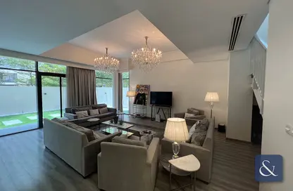 Living Room image for: Villa - 5 Bedrooms - 6 Bathrooms for rent in Brookfield 1 - Brookfield - DAMAC Hills - Dubai, Image 1