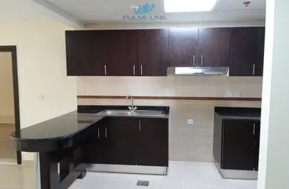 Kitchen image for: Apartment - 2 Bedrooms - 2 Bathrooms for rent in Infinity Building - Sheikh Zayed Road - Dubai, Image 1