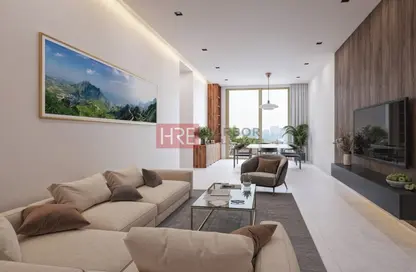 Living Room image for: Apartment - 2 Bedrooms - 2 Bathrooms for sale in Levanto By Oro24 - Jumeirah Village Circle - Dubai, Image 1